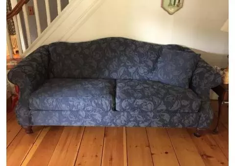 Blue traditional camelback sofa